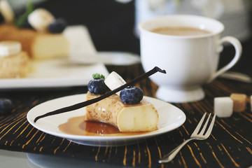 Coffee mousse served with fruits and berries
