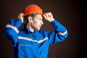 young engineer wear personal helmet or protective equipment b
