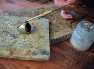 Soldering of a silver ring. Taken in the Golden City of Pforzheim, Germany.
