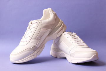 women's sneakers on a colored background. Women's shoes.