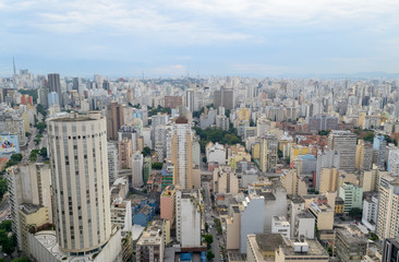 Fototapeta premium Aerial view of Sao Paulo in Brazil, downtown district seen from the top of one of the highest building of this city