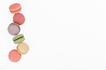 colorful macaroons food background flat lay