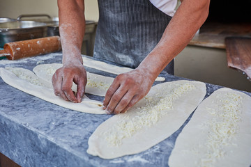 Pide turkish traditional pizza being cooked