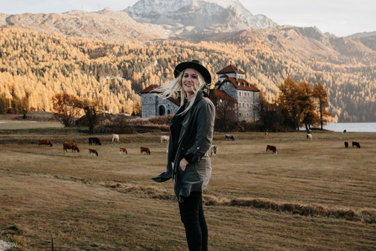 Young woman travelling through Switzerland, looking at nature