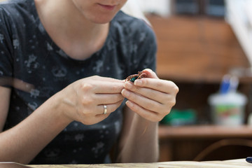 The girl creates creations