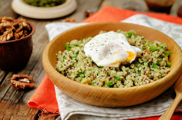 Basil nuts pesto quinoa with walnuts, parsley and poached egg