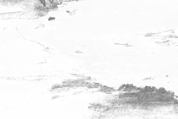 Grey watercolor texture with abstract washes and brush strokes on the white paper background.