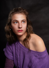 Fototapeta premium Beautiful Young Woman on Black Background