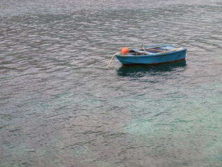 Boat on clear sea under day light