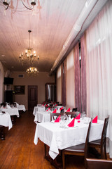 restaurant interior dinner service for dinner and breakfast glass plate glass spoon spoon tablecloth and dishes