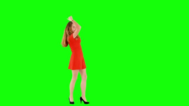 Woman in Red Dress and High Heels Dancing on Green Screen