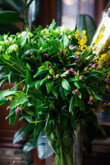 Fototapeta na wymiar bouquet of flowers greens in the store