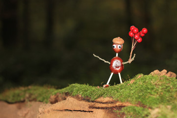 Crafted chestnut male with balloons © ramonr