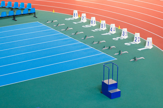 Sprint start line with blocks on track and field