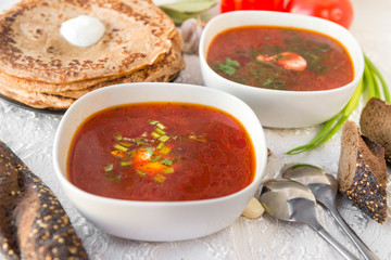 borsch, pancakes, spoons, bread, red soup