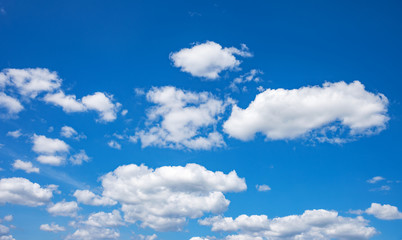 Blue sky with white clouds. Summer sky.