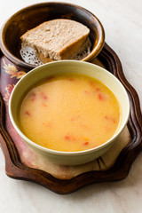 Homemade Potato Pumpkin Soup served with Bread.