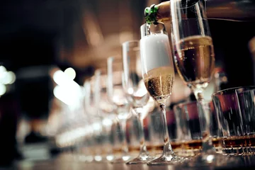 Fotobehang Many glasses of champagne and glasses of whiskey © ruslanseradziuk
