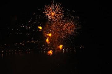 Fototapeta na wymiar Fireworks on the sea