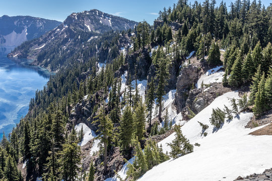 Crater Lake And Surrounding Area With Snow