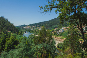 Fototapeta na wymiar view on a small portuguese village and river Mondego