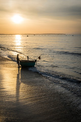 fishermen at sunset Vietnam