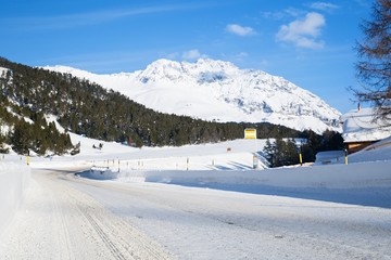 Fototapeta na wymiar winter road and snow with landscape forest mountain