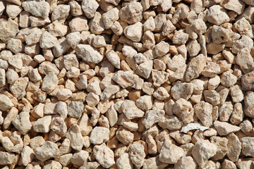 Medium gravel of warm tones background