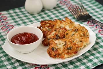 Homemade chicken patties. Chicken fillet is fried and served with tomato sauce