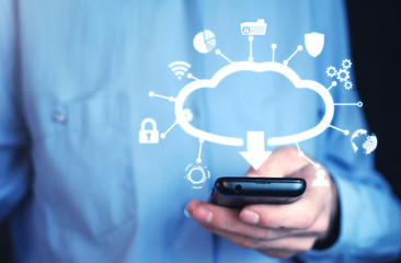 Man holding mobile smartphone. Cloud download concept
