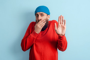 Expressive stylish man making excuses feeling shame