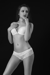 Naklejka premium young sexy girl in white lingerie