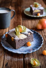 Poppy seed sponge cake with physalis and pear