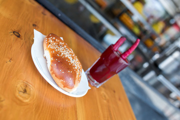 Traditional turkish drink turnip juice (Salgam) and turkish bagel