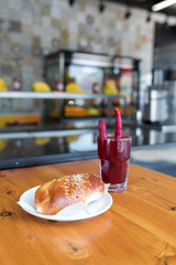 Traditional turkish drink turnip juice (Salgam) and turkish bagel
