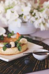 Coffee mousse served with fruits and berries