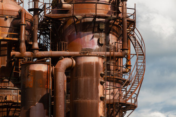Close-up of industrial pipelines of an oil-refinery plant