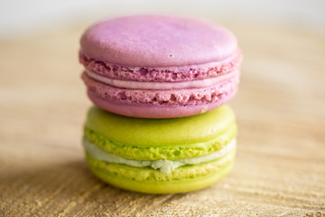 Two stacked colorful macaron cookies 