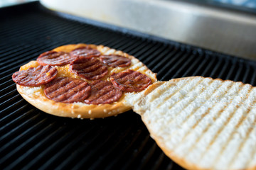 Toast sandwich breakfast with cheese and sausages