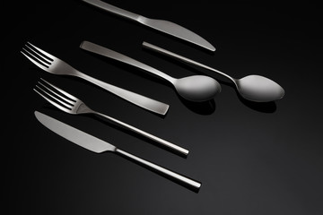 Cutlery Set with Fork, Knife and Spoon  on Black Bacground