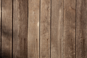 Brown wood planks background texture closeup