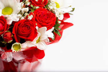 Beautiful designer bouquet of flowers in a beautiful cramped blue bucket.Isolated on a white background.Top view.