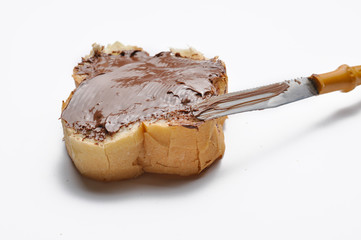Bread with chocolate nougat cream. Breakfast