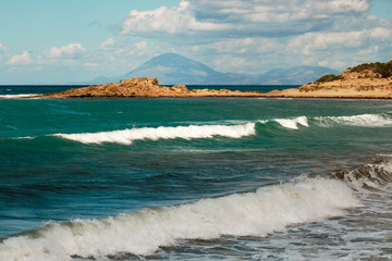 Fototapeta na wymiar Beautiful seascape with mountains in the background
