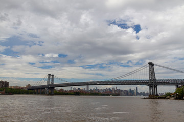 New York City - beautiful sky over manhattan with manhattan bridge