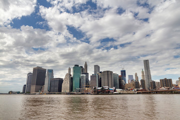 Naklejka premium New York City panorama skyline at sunrise. Manhattan office buildings. skysrcapers at the morning