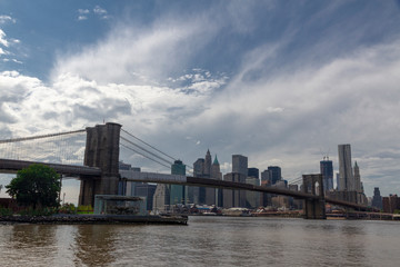 Fototapeta na wymiar New York. View of Lower Manhattan and Brooklyn Bridge skyline on a sunny summer day
