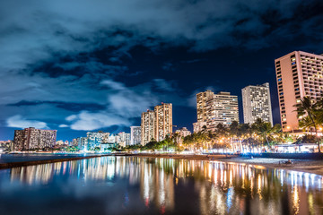 Fototapeta na wymiar Downtown Honolulu Beach Skyline Night Wide