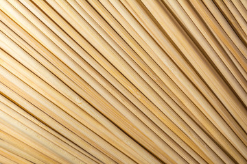 Round wooden sticks background. Close-up Wall Pattern