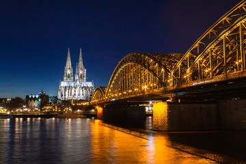 Cologne skyline with Cologne Cathedral and Hohenzollern bridge at night - 249615992